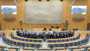 Group photo with Speakers in the Chamber.