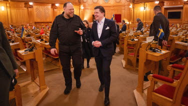 The two Speakers enter the former Second Chamber together.