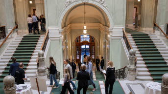 People mingling in the grand stairway
