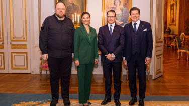 The Two Speakers standing on each side of Crown Princess Victoria and Prince Daniel at the Royal Palace.